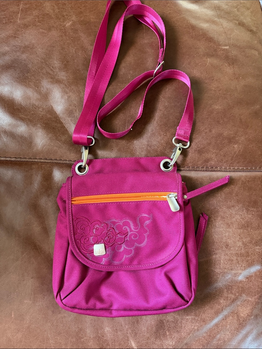 Haiku Fuchsia Crossbody Bag with Orange Zip Accent